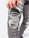 VANDALIZED CAGED DAMAGE DENIM：ヴァンダライズド ケイジド ダメージ デニム